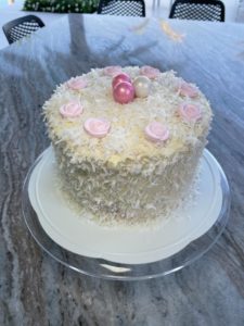 Layered coconut and raspberry cake recipe by home cooking with julie neville2